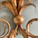 Wall lamp in gilded brass with a daisy design.