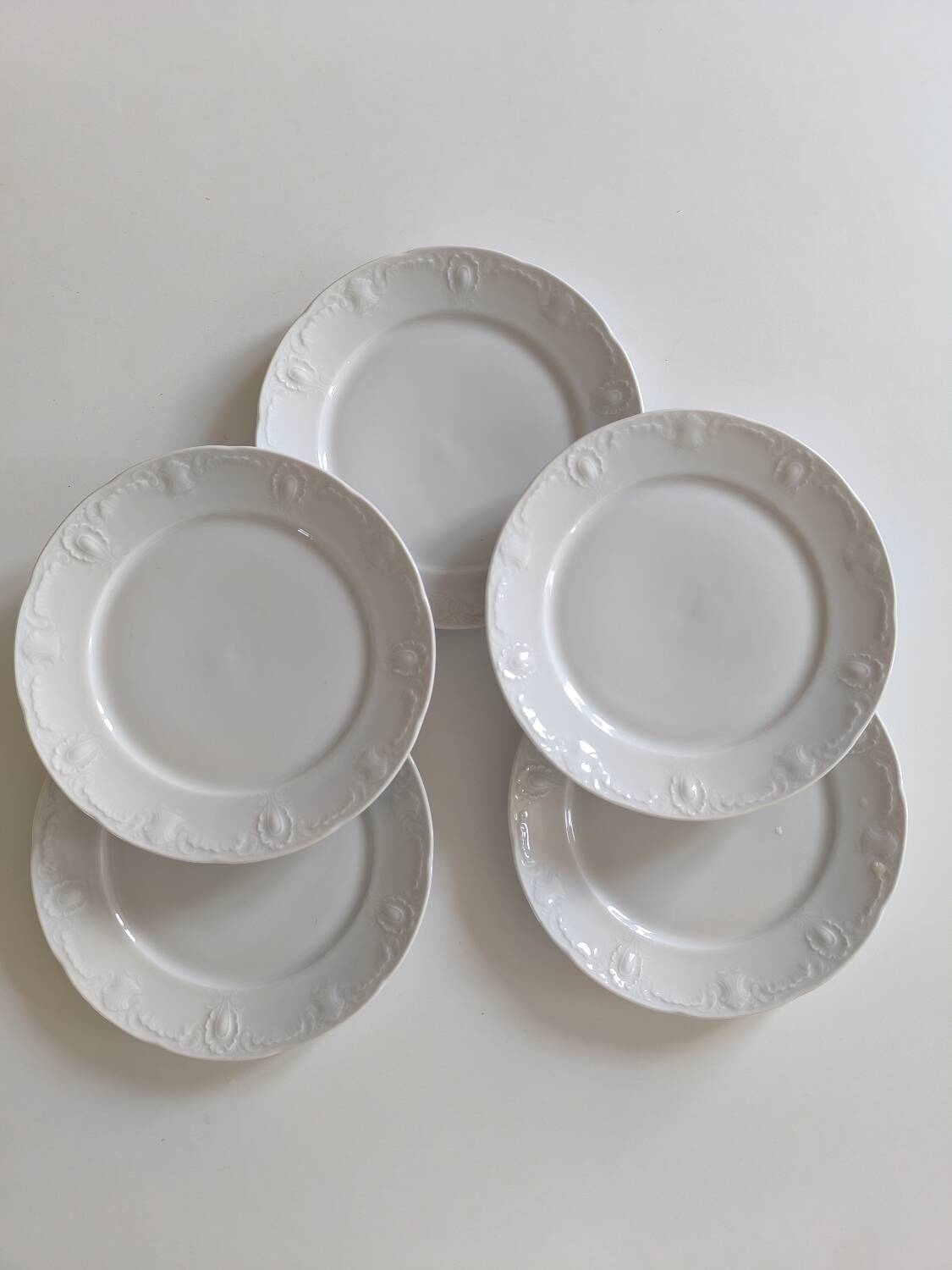 Set of five porcelain dessert plates