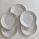 Set of five porcelain dessert plates