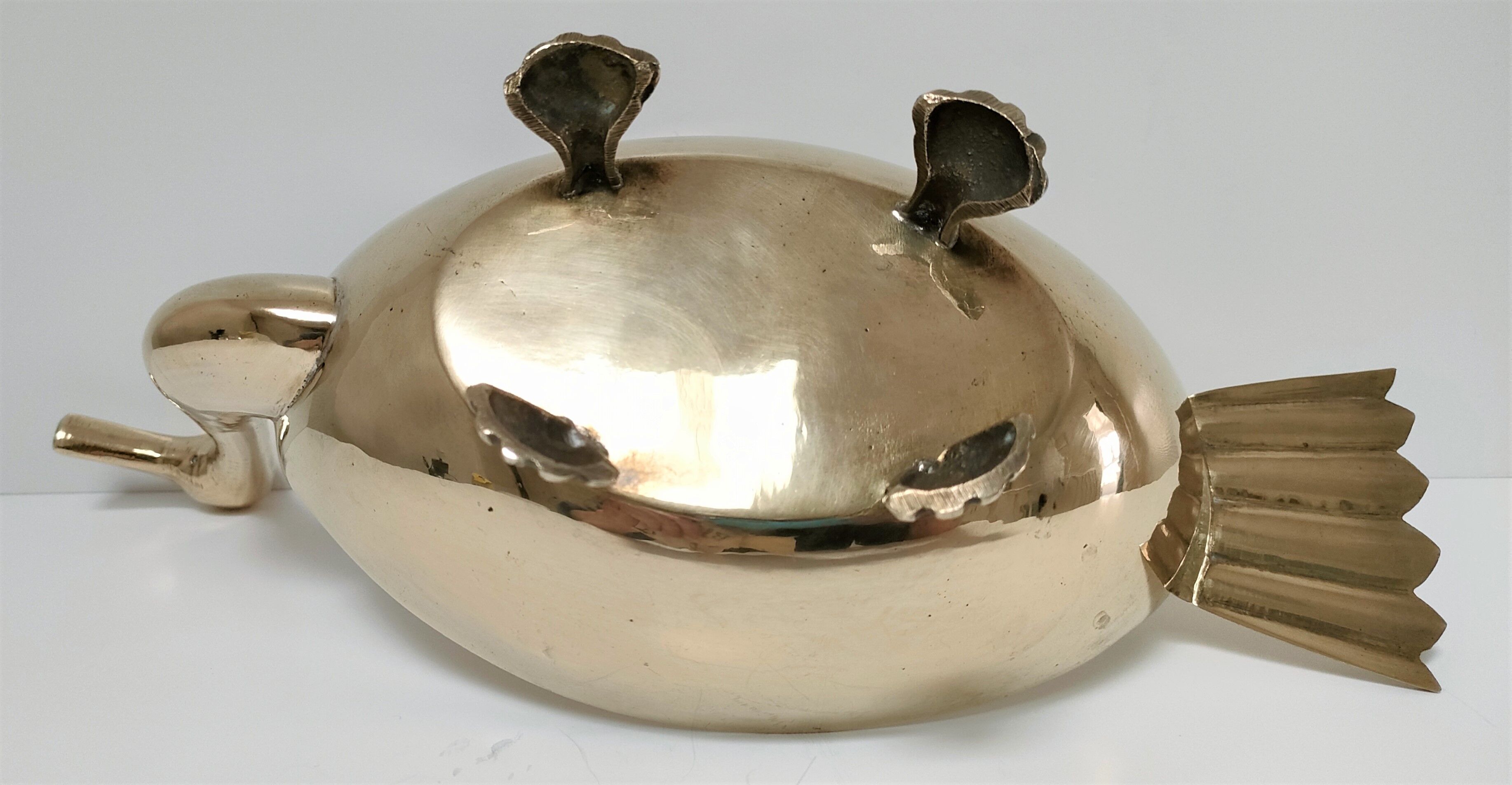 Zoomorphic cut brass bird 70s