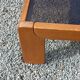 Coffee table from Regain in solid elm with a smoked glass top.