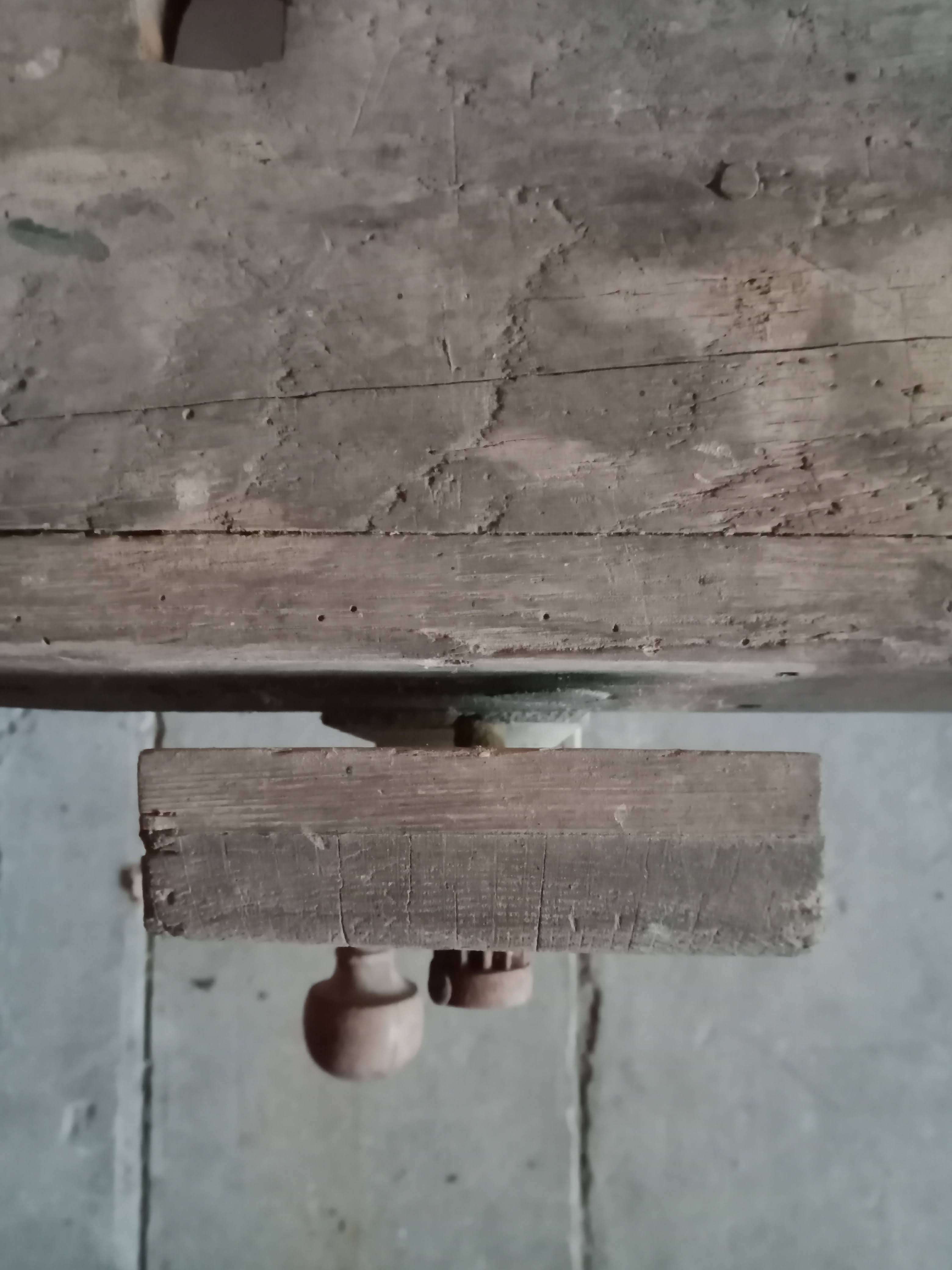 antique workbench with one drawer and two vices