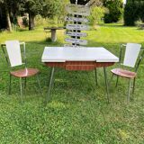 White Formica table with extensions and 2 designer chairs