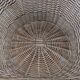 Large woven rattan armchair