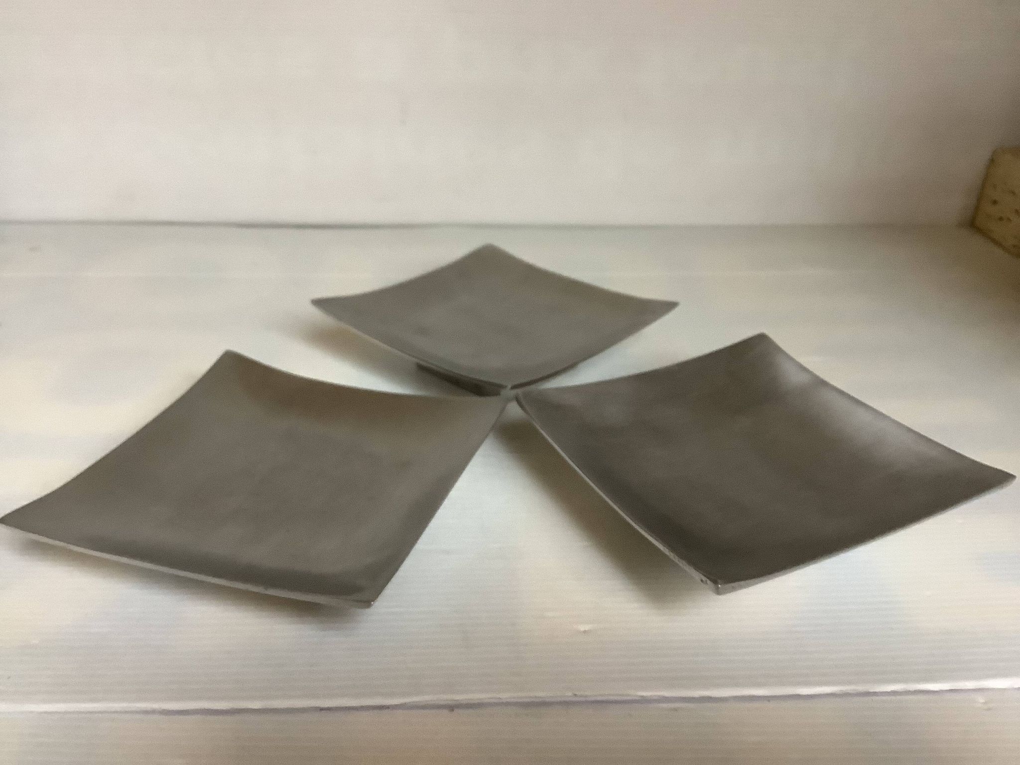 Three silver-plated metal trinket trays/candle holders