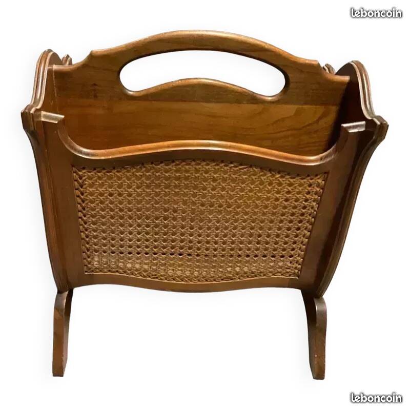 Vintage wicker newspaper rack