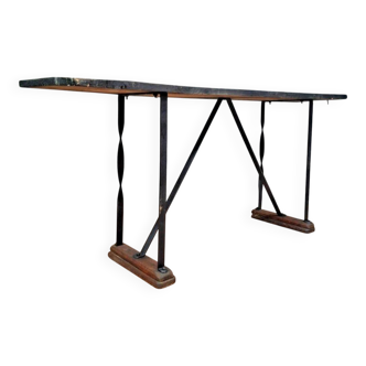 console / industrial-style table, full of character.