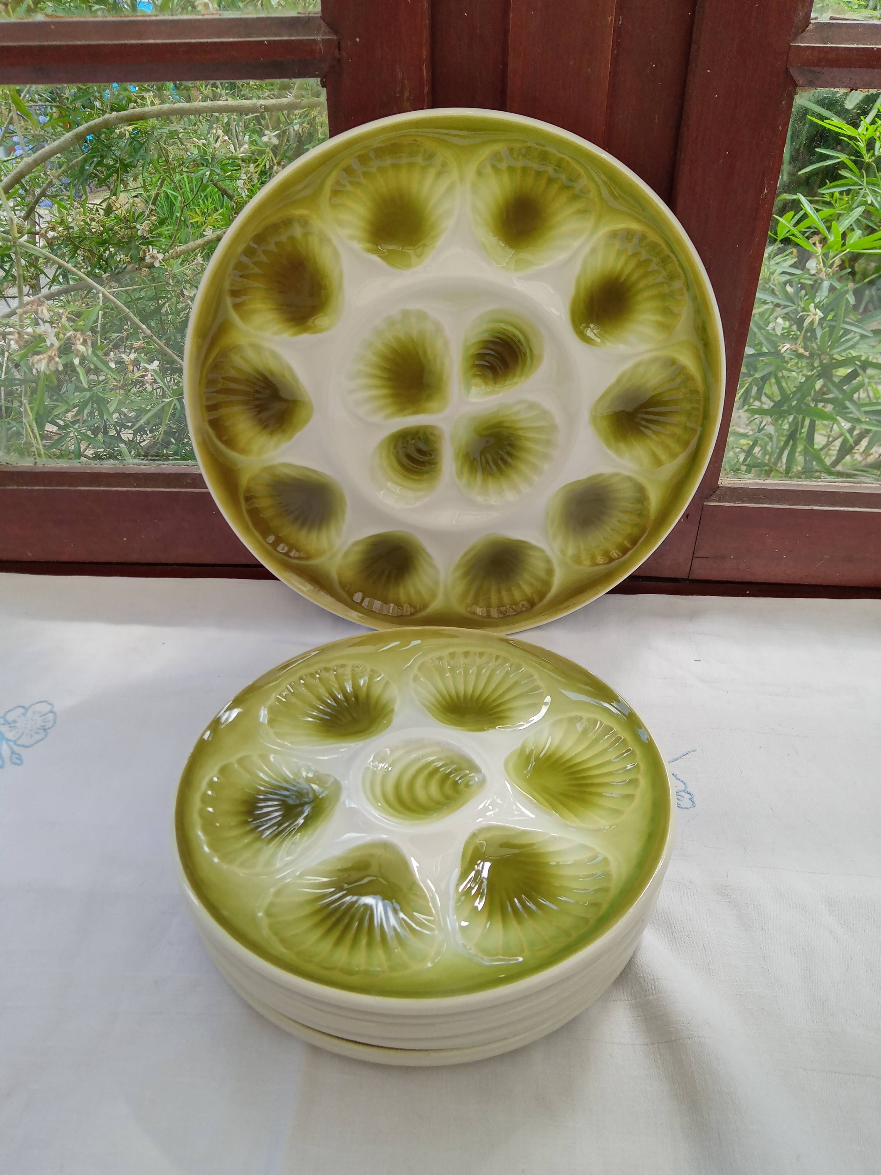 12 oyster plates and Moulin des loups dish