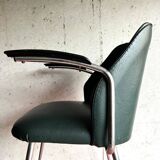 Vintage green faux leather and chrome armchair