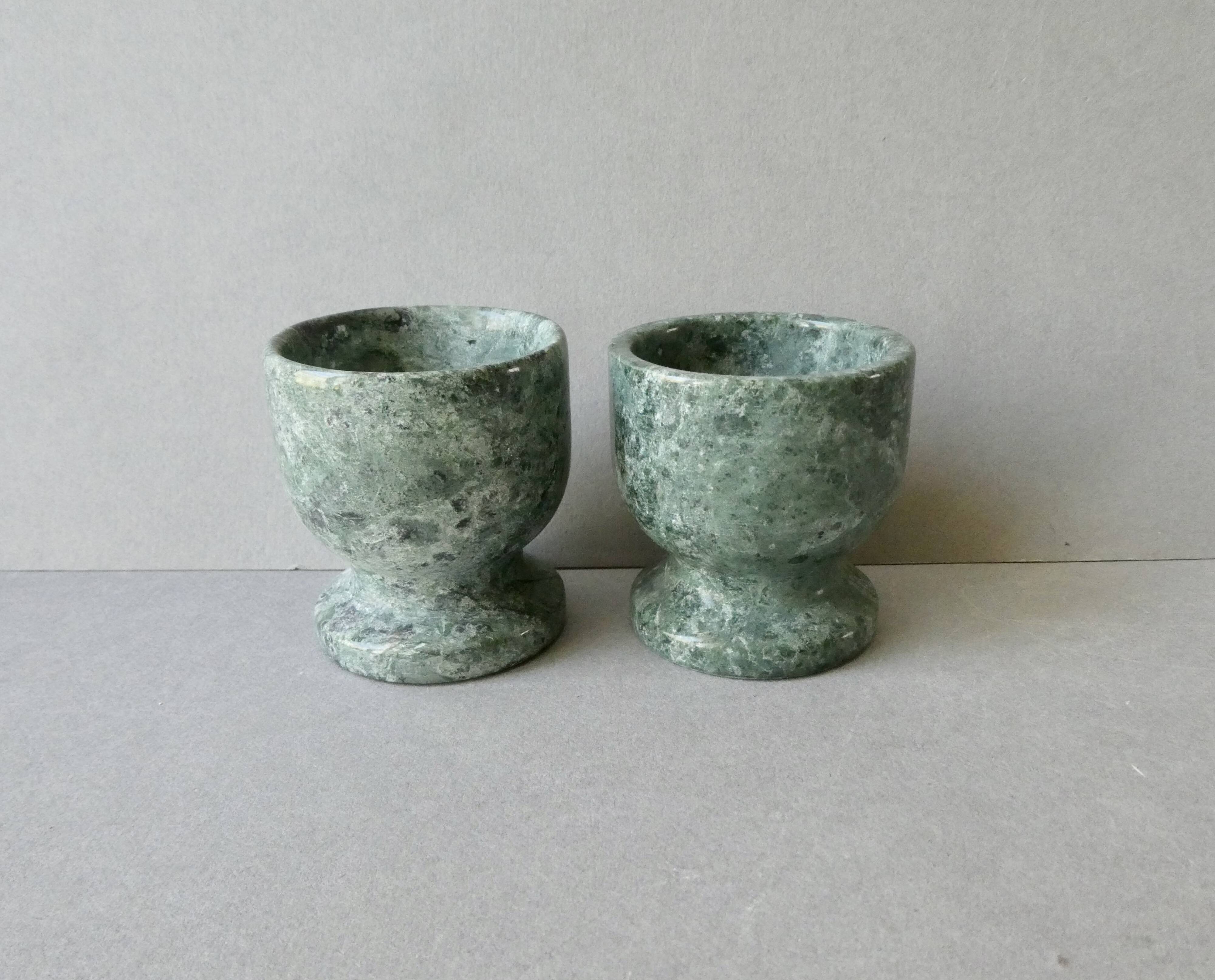 2 marble egg cups in veined white and green, circa 1980.