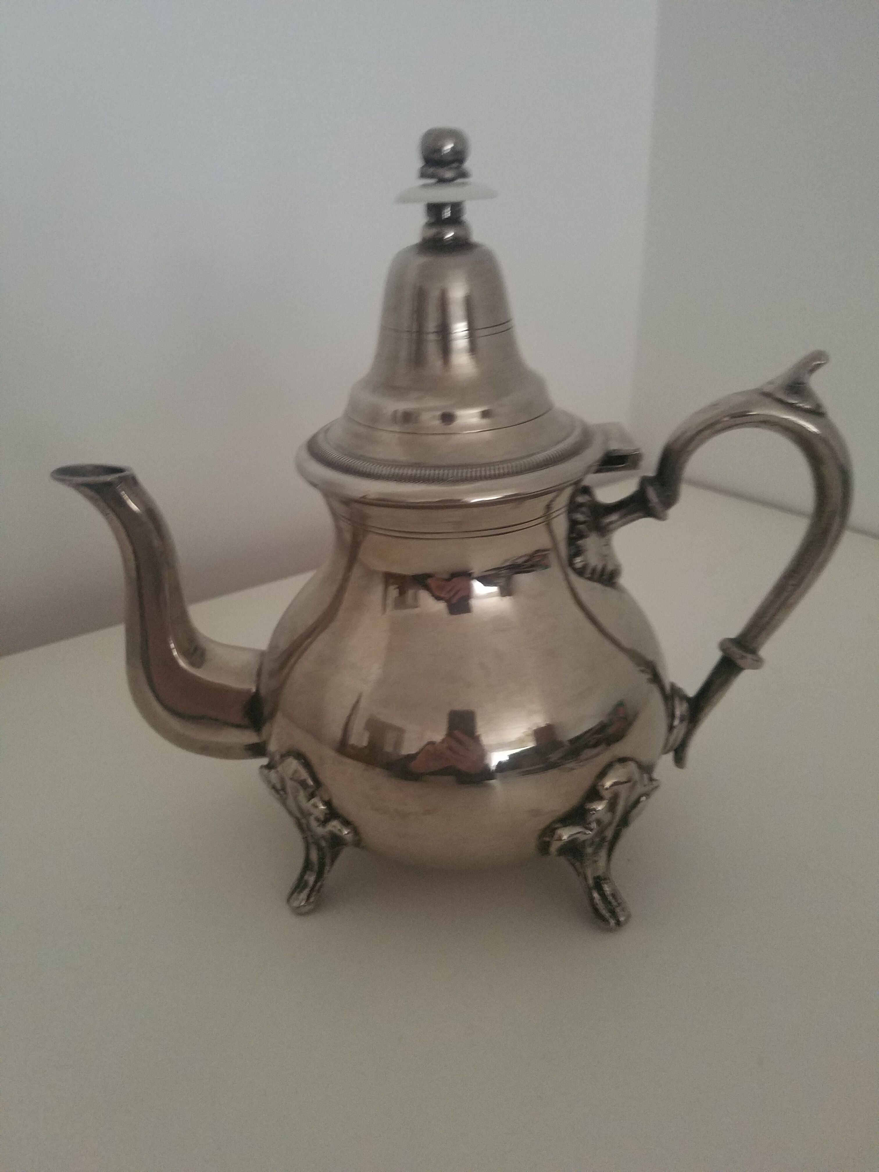 Oriental teapot in silver metal