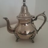 Oriental teapot in silver metal