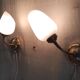 Articulated brass and opaline wall lights - mid 20th century.