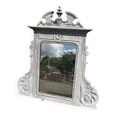 Miroir en bois sculpté patiné
