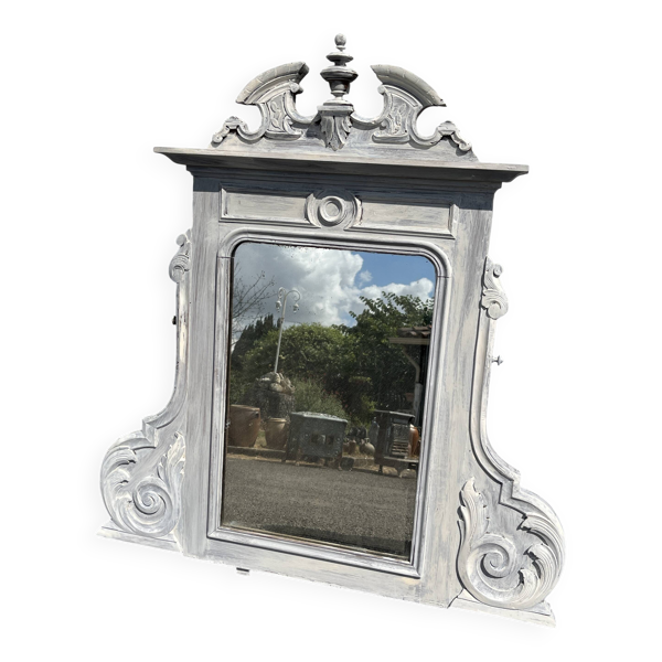 Miroir en bois sculpté patiné