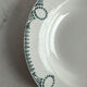 Céranord Saint Amand deep plate with green crown decoration.