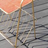 Perforated sheet metal magazine rack in the style of Mathieu Mategot, 1950s
