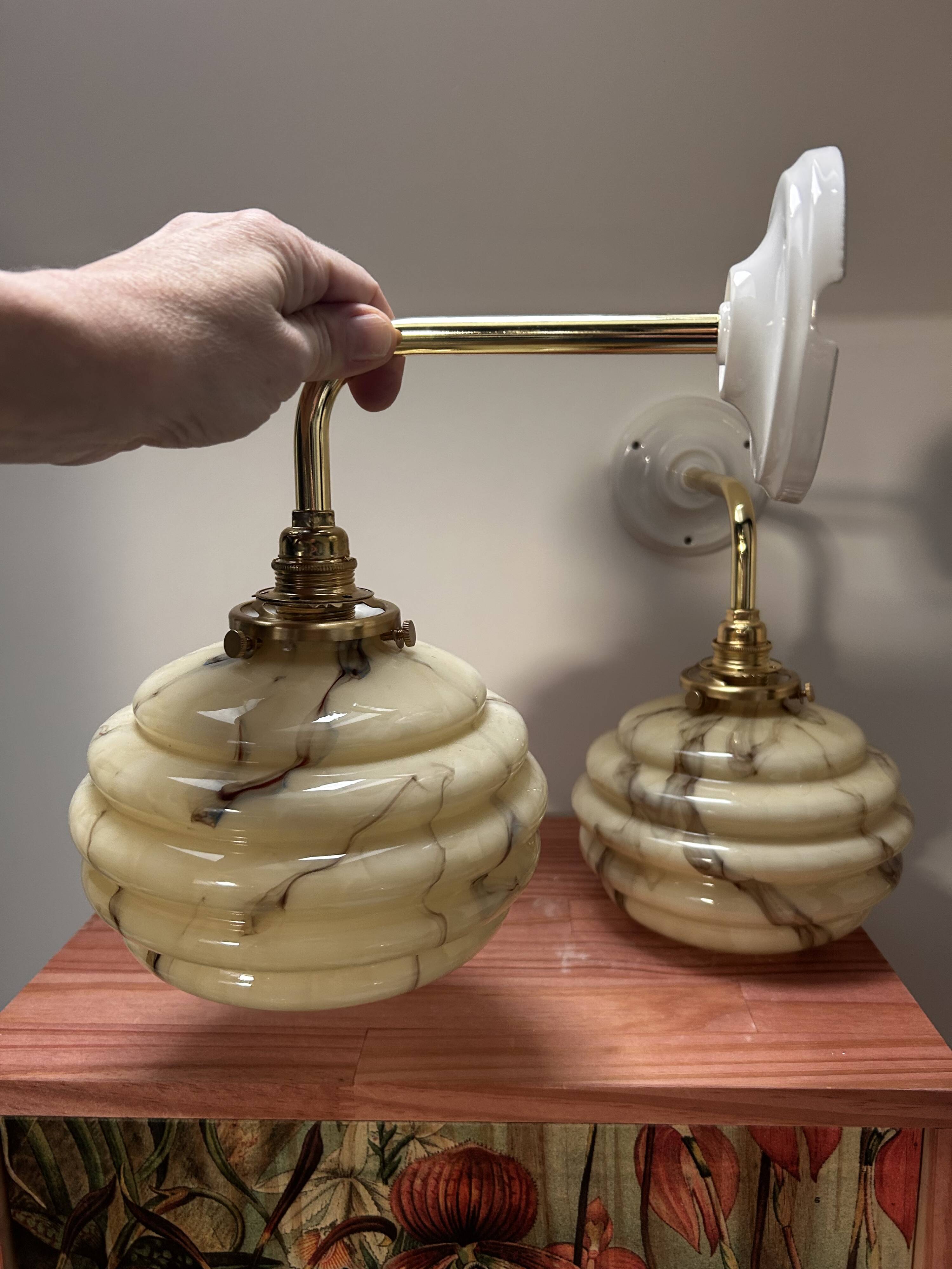 Pair of vintage marbled opaline globe wall lights