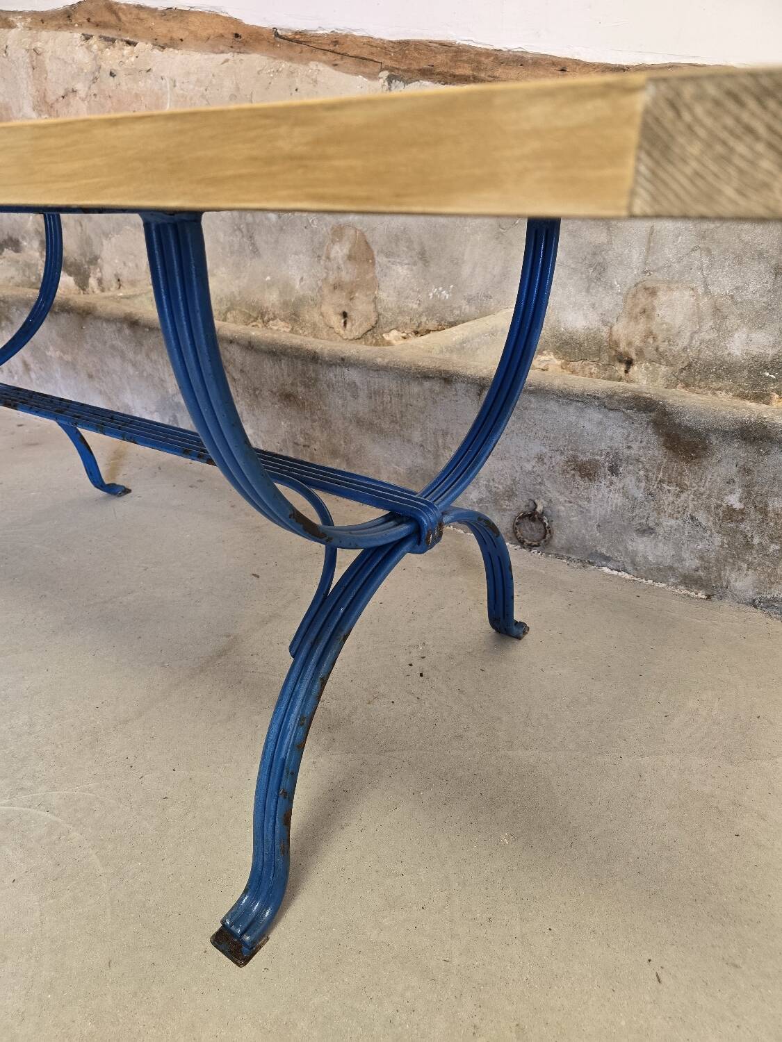Wrought iron and solid wood table