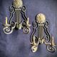 Pair of neoclassical wrought iron wall lights