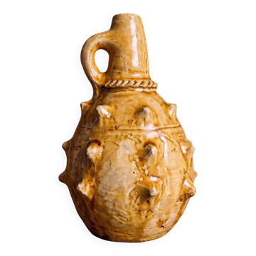Glazed terracotta amphora with twisted cord.