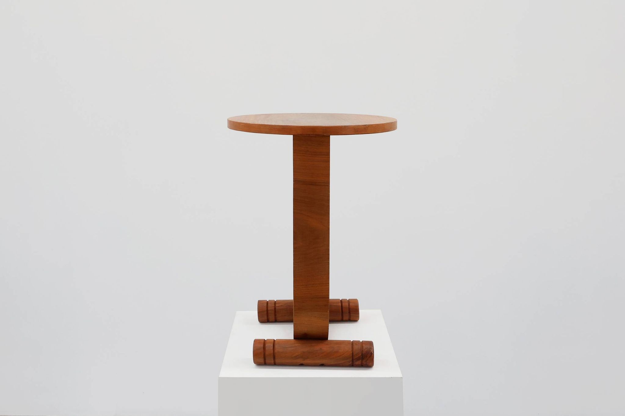 Art deco oak wooden round side table with bended leg, France 1920s