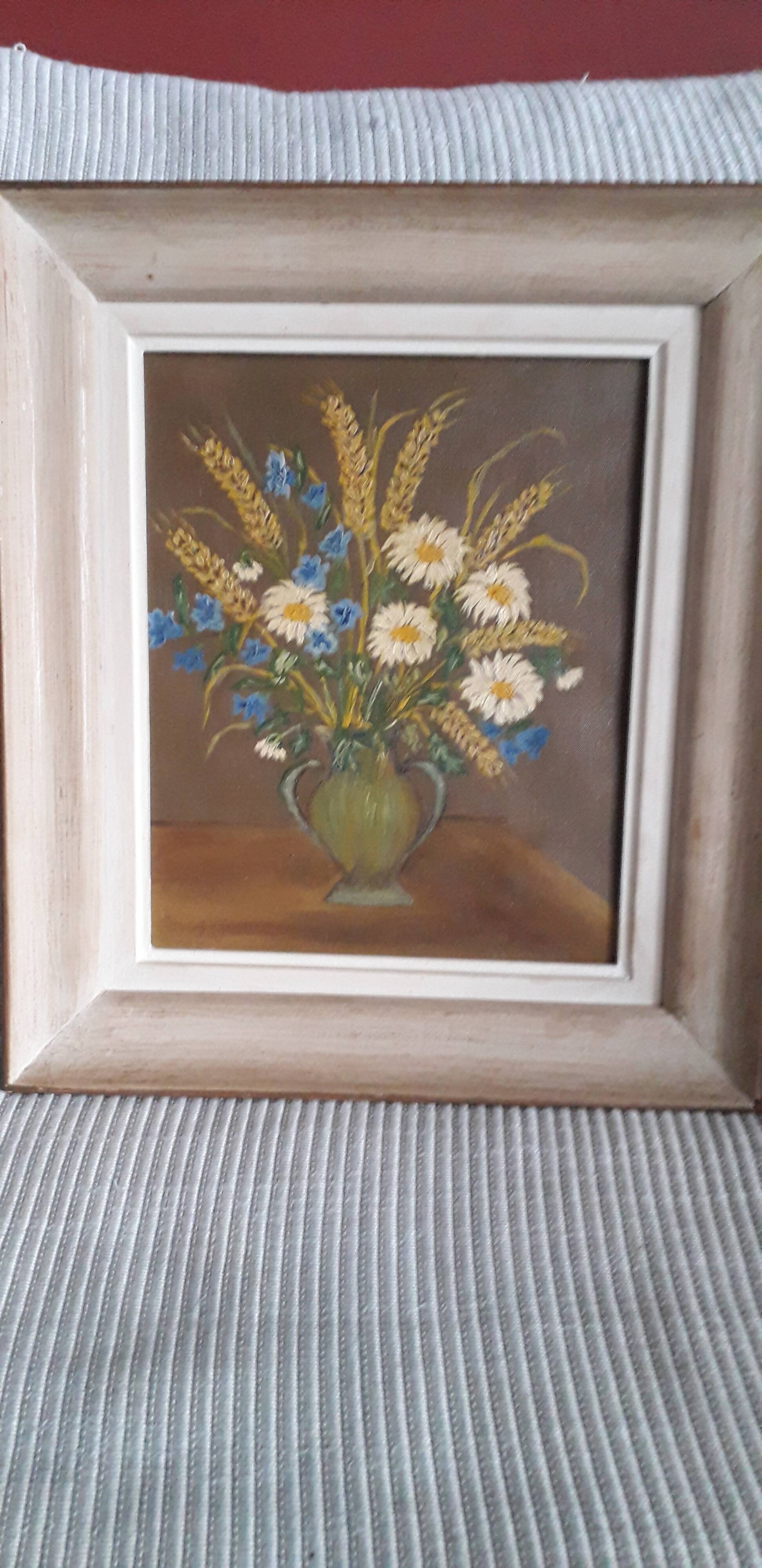 Old oil painting representing a bouquet of flowers