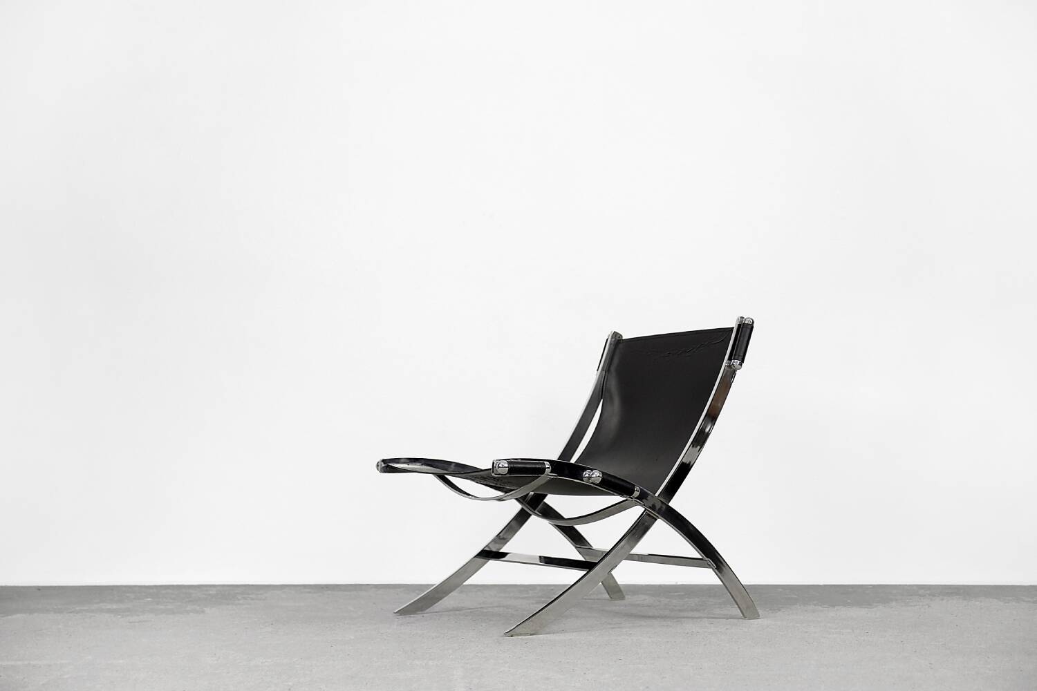 Vintage minimalist chair in Italian leather, 1980s.