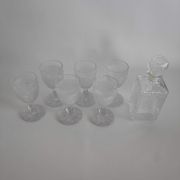 Vintage molded glass foot glasses and carafe from the years 60