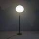 Mid-century black leather and brass floor lamp by Falkenbergs Belysning, Sweden, 1960s.