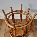 Pair of honey-colored rattan stools/plant holders in the 60s