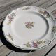 Half porcelain dish of Lunéville, Keller and Guérin, floral decoration.