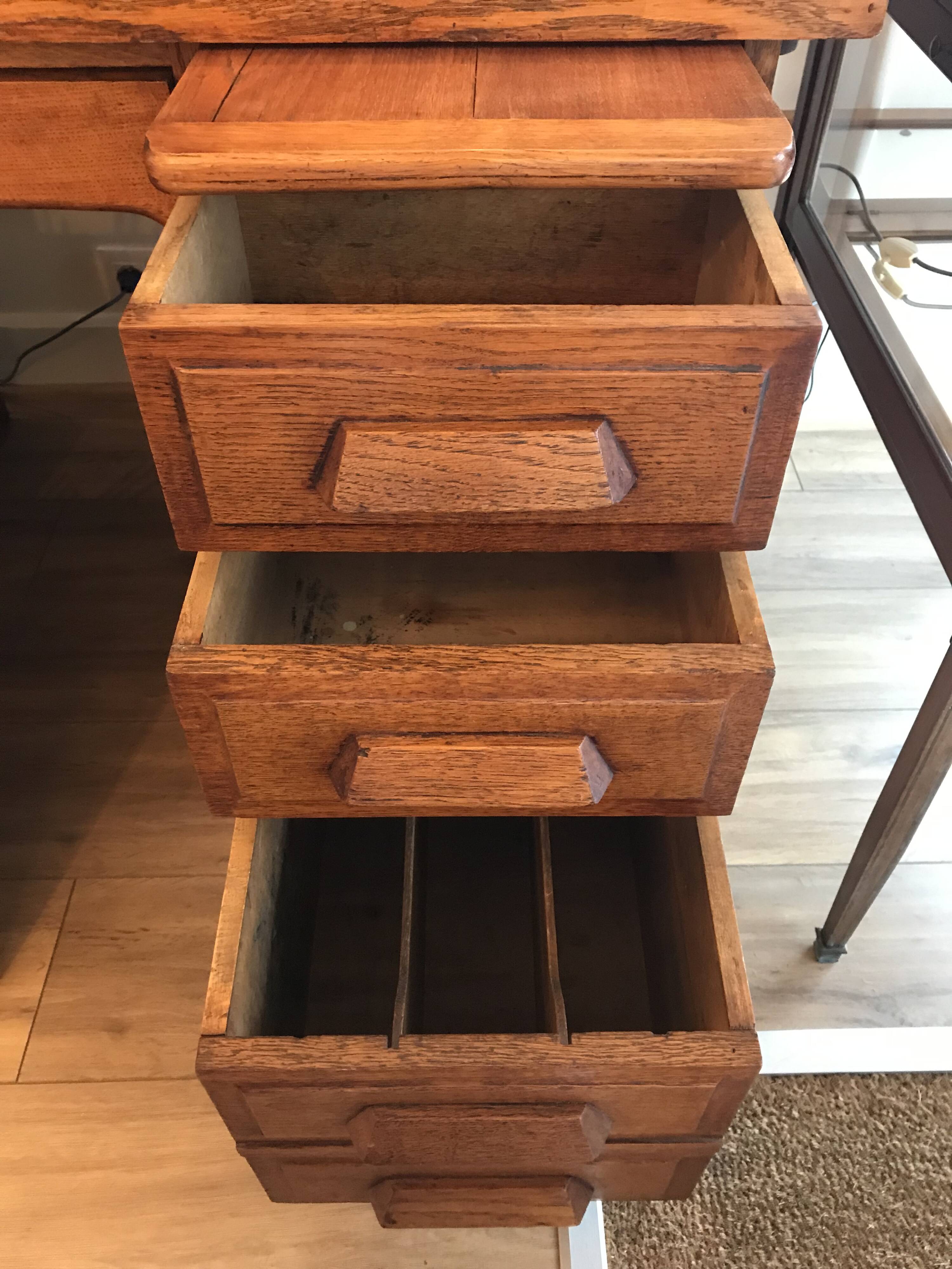 American desk with sliding shutter in solid oak, 20th century