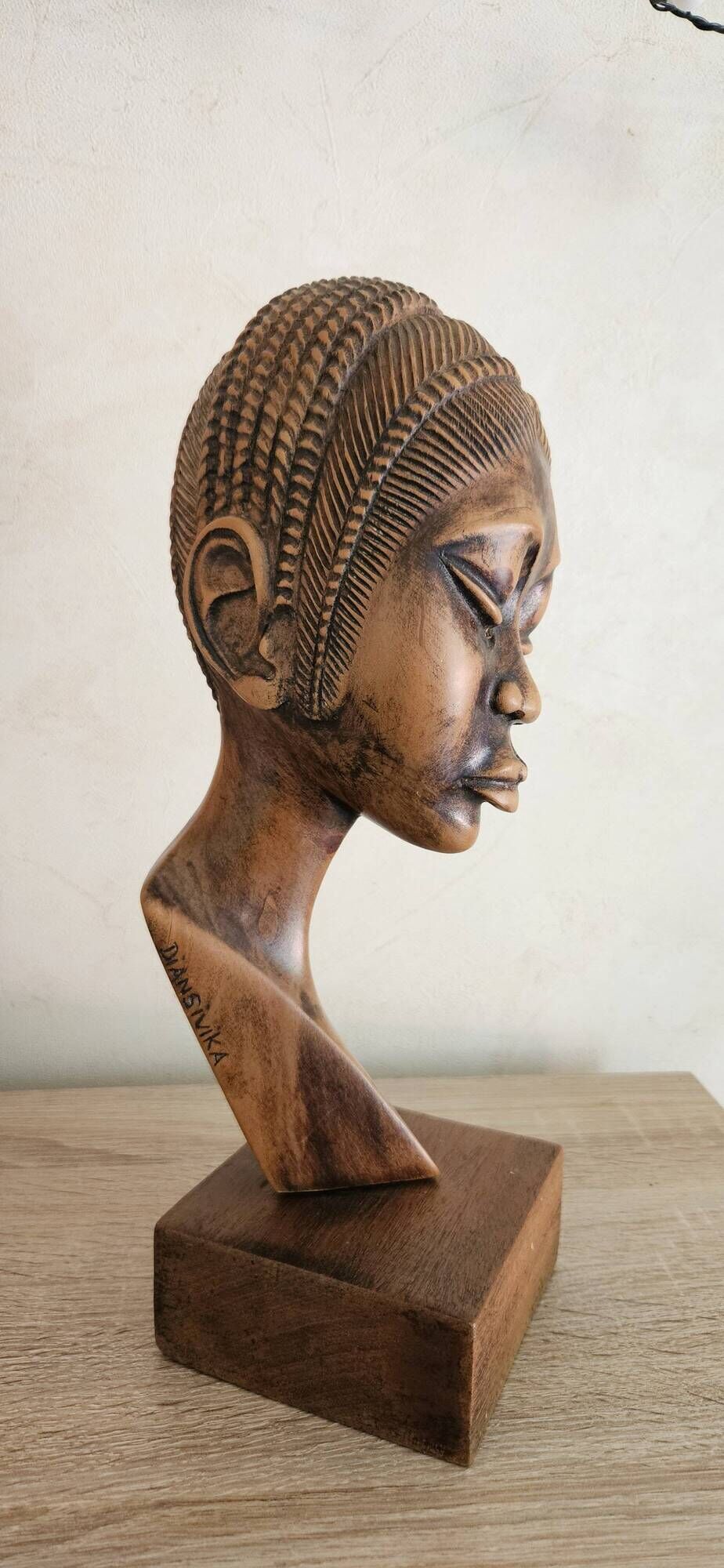 Bust of an African woman in precious wood