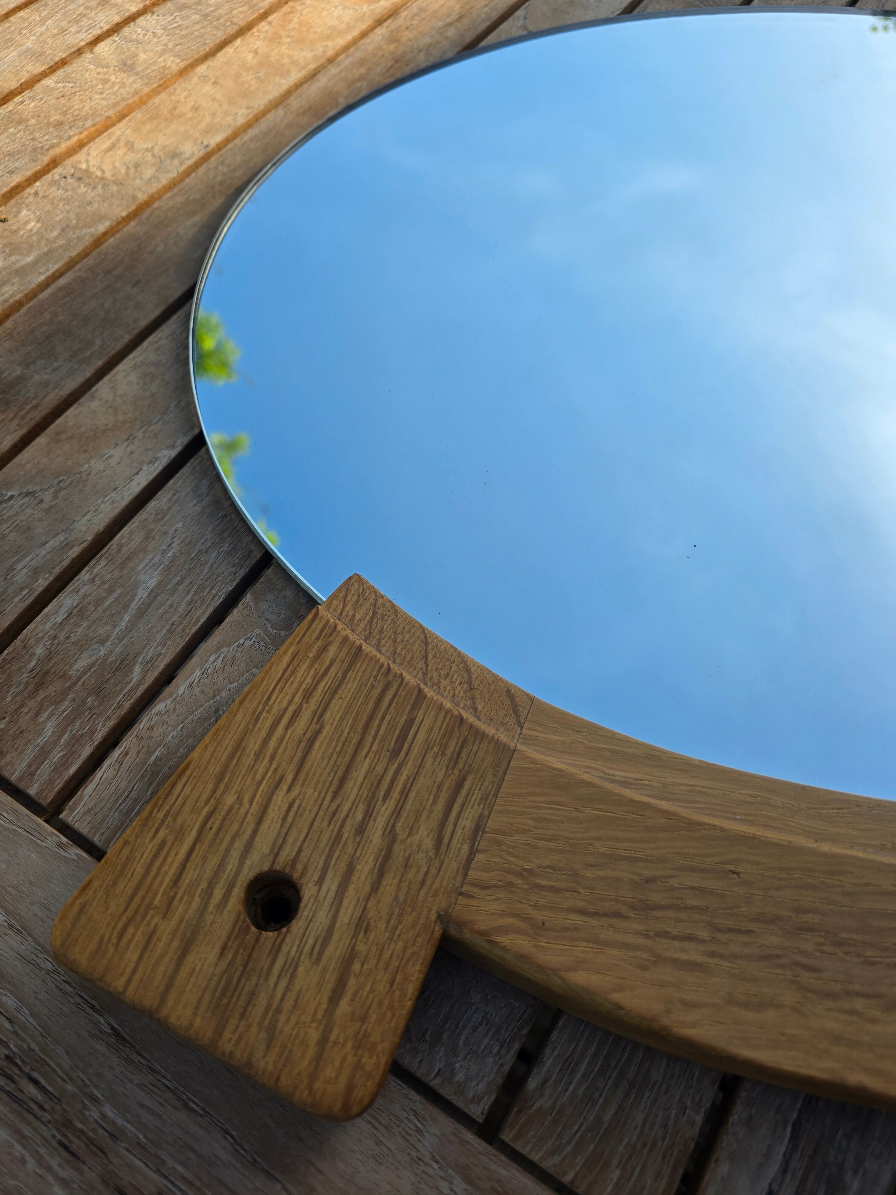 Oval mirror by Guillerme and Chambron