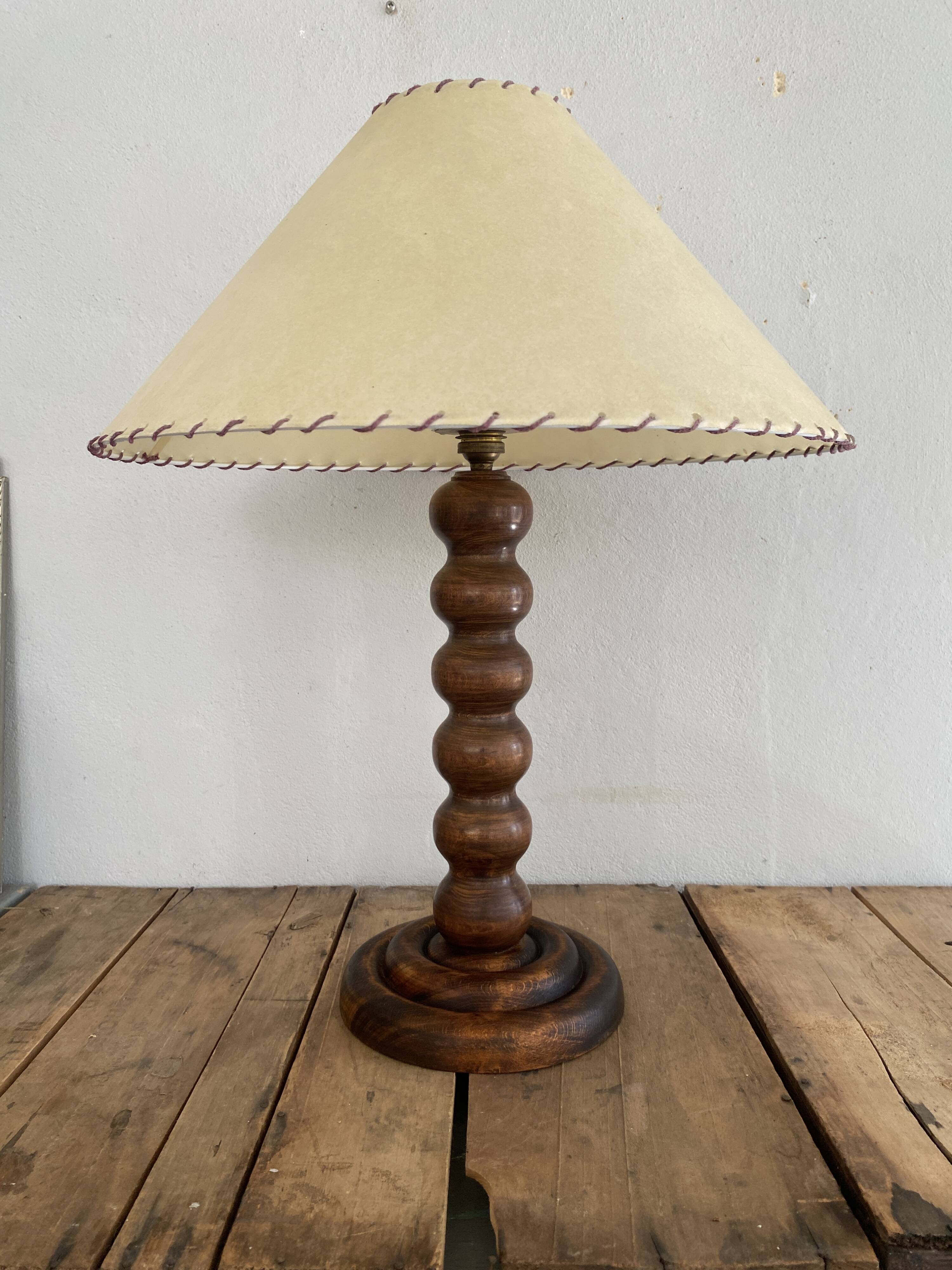 Turned wood lamp with paper shade