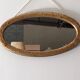 Art Deco oval mirror in gilded wood, France circa 1920