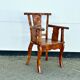 Hand stabbed teak armchair