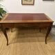 Louis XV style marquetry desk – antique leather top