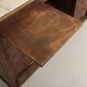 Small vintage stained wooden countertop with 2 shelves and 10 drawers