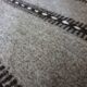 Handwoven vintage geometrical rug, grey background