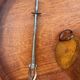 Amber bubble glass ice bucket signed Biot, with its tongs.