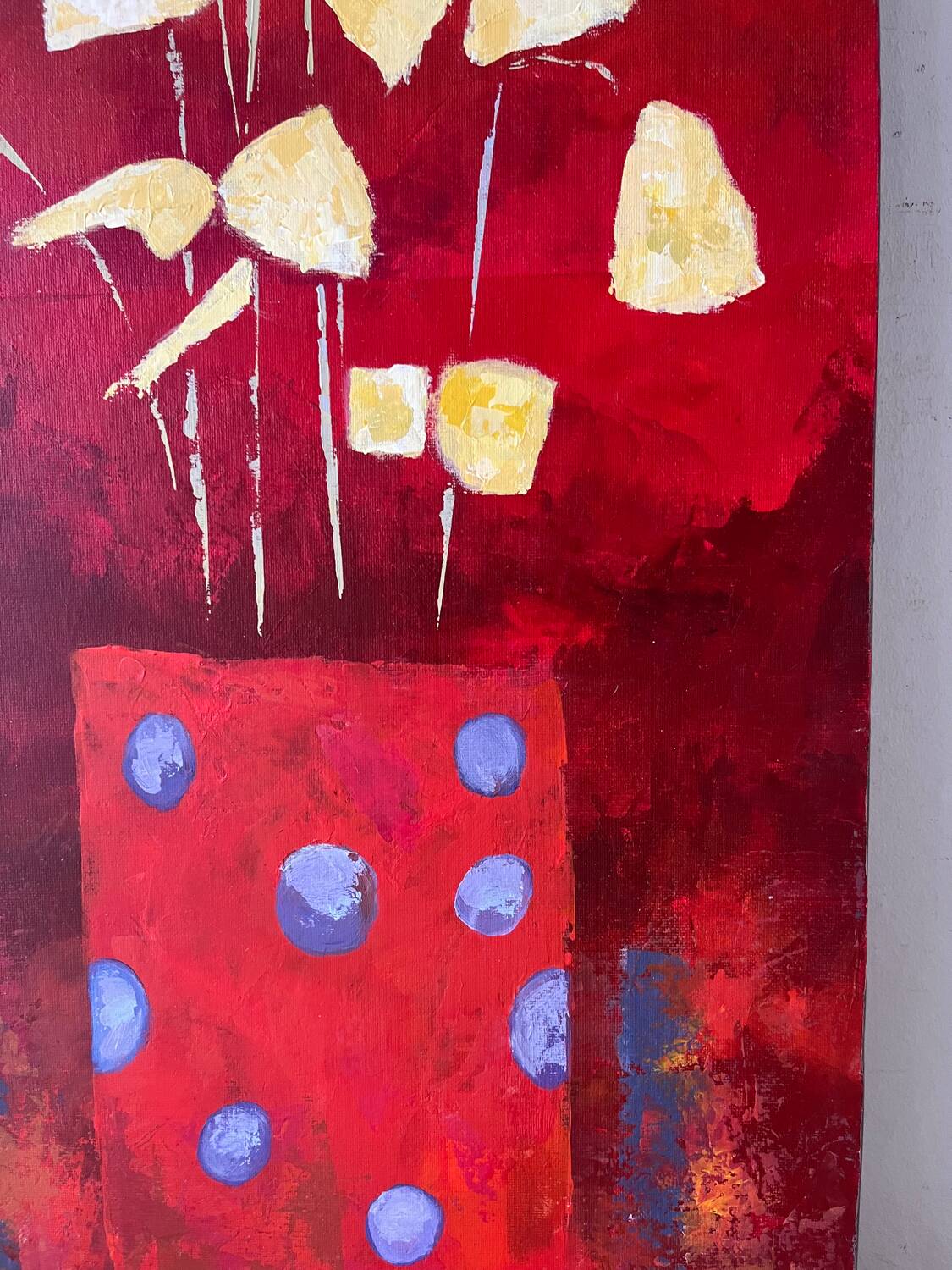 Golden flowers in a polka dot vase