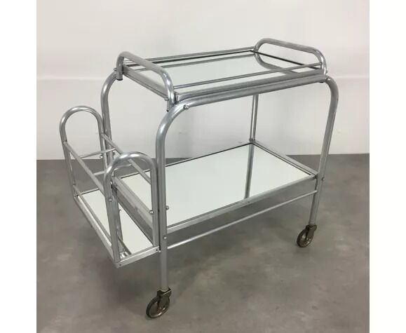 Modernist service mirrors and metal