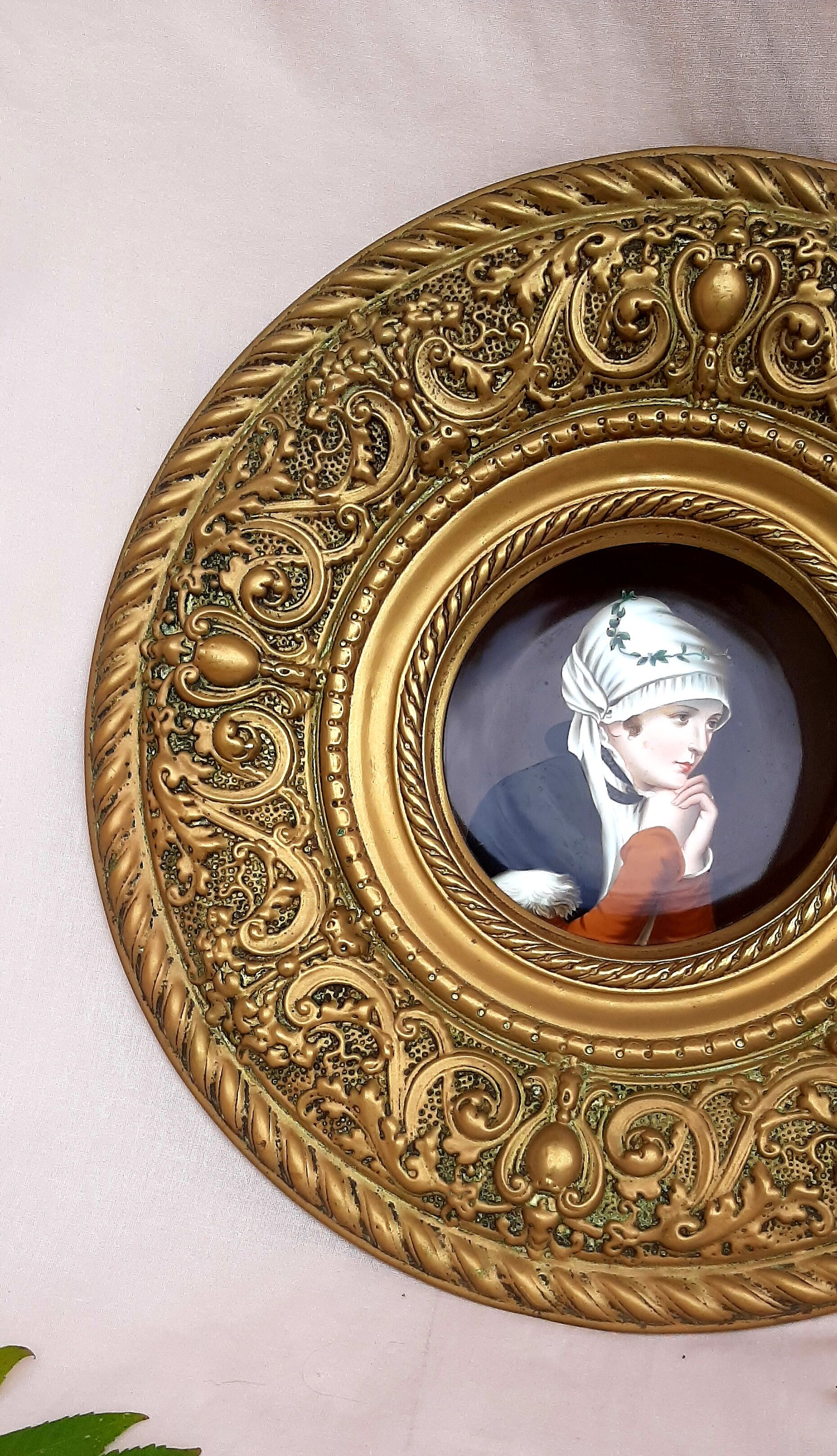 Brass wall decoration repelled hand-painted portrait