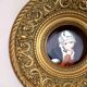 Brass wall decoration repelled hand-painted portrait