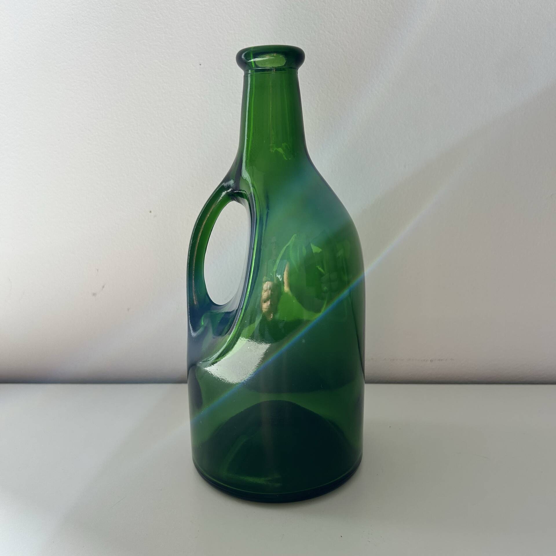 Green glass bottle