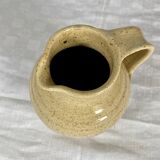 Turned and glazed stoneware wine pitcher