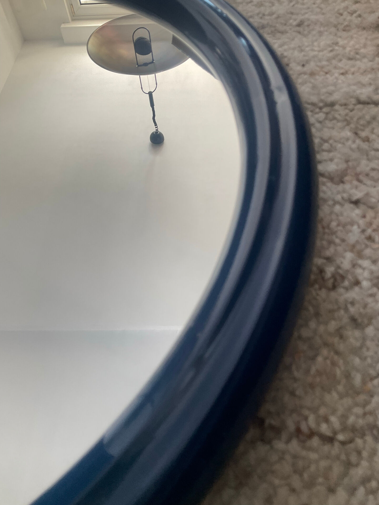 Round Tiger mirror from the 1970s.