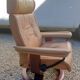 Pair of vintage original ekornes stressless armchairs with stool